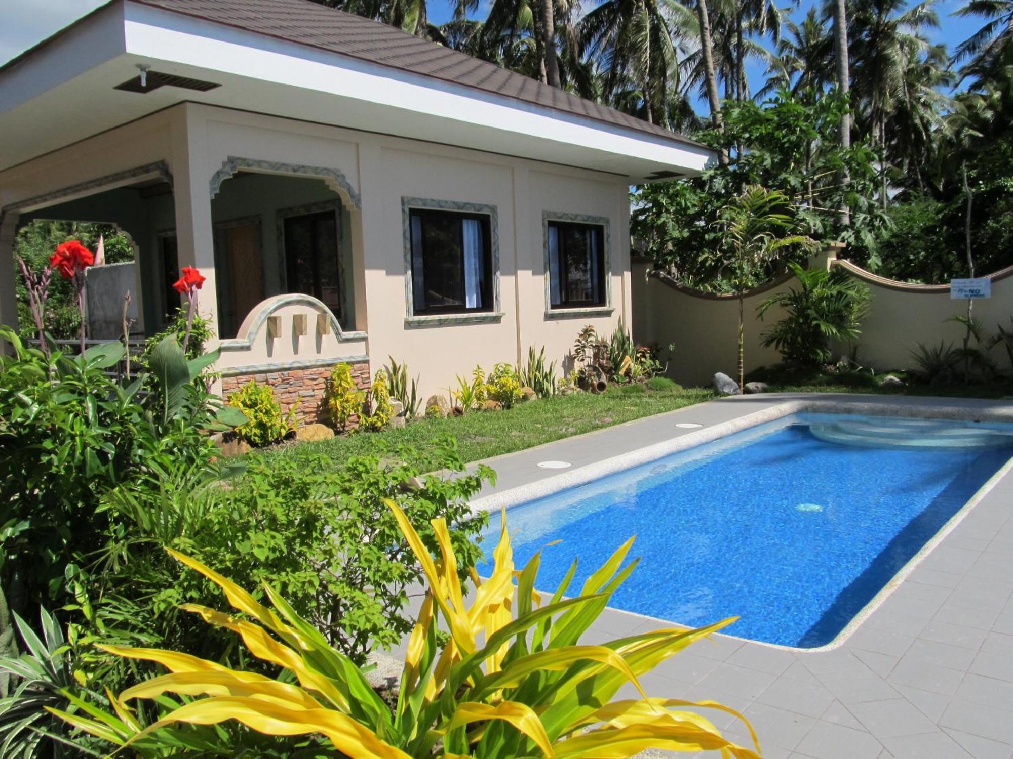 Ucoy Beach Resort Libertad Exteriör bild